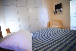 Apartment mit 2 Schlafzimmern und Meerblick, Wohnbereich - Zorbas Apartments Volissos Chios