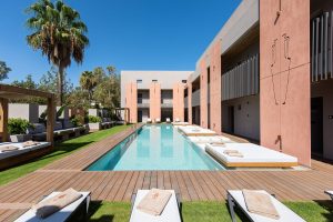 Pool und Hotelgebäude – Pilot Amphora Boutique Hotel, Georgioupoli